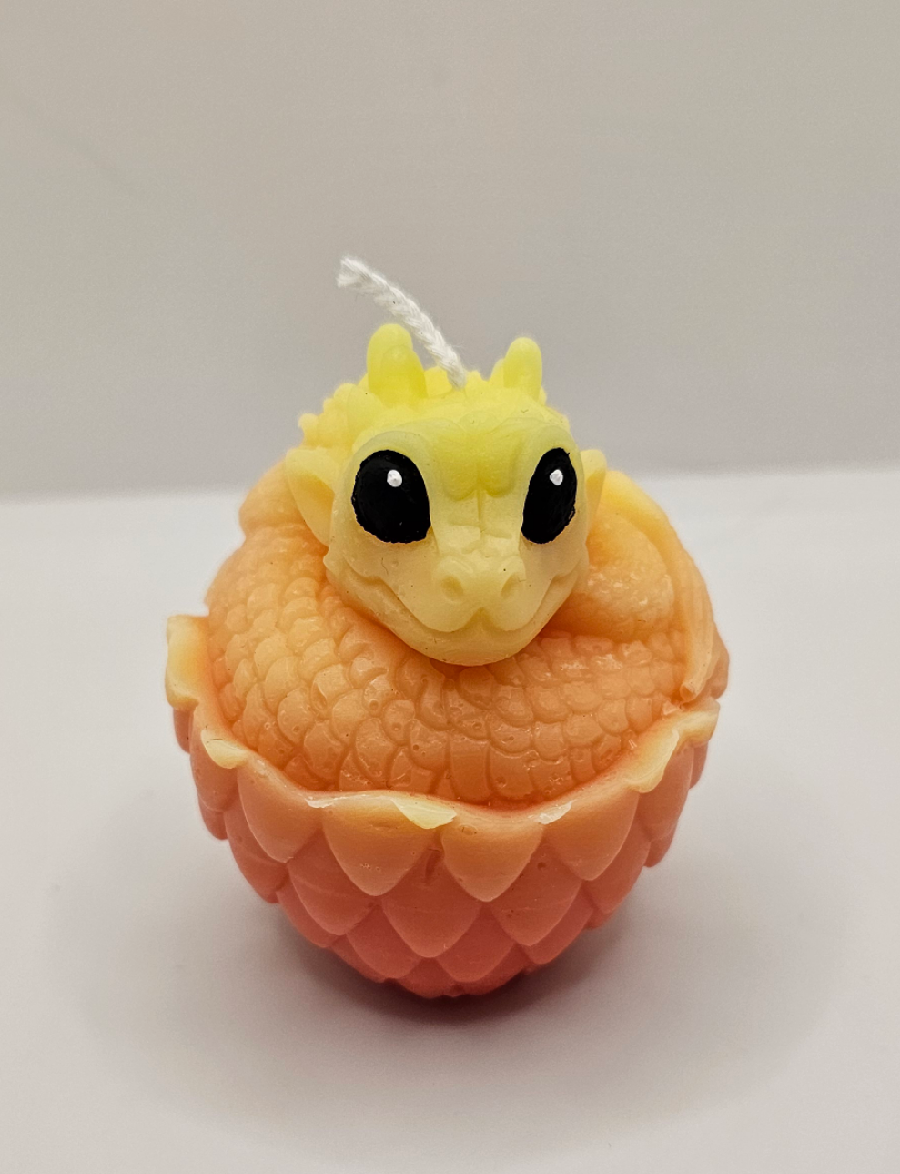 Kleine Drachenschlange im Ei gelb-orange